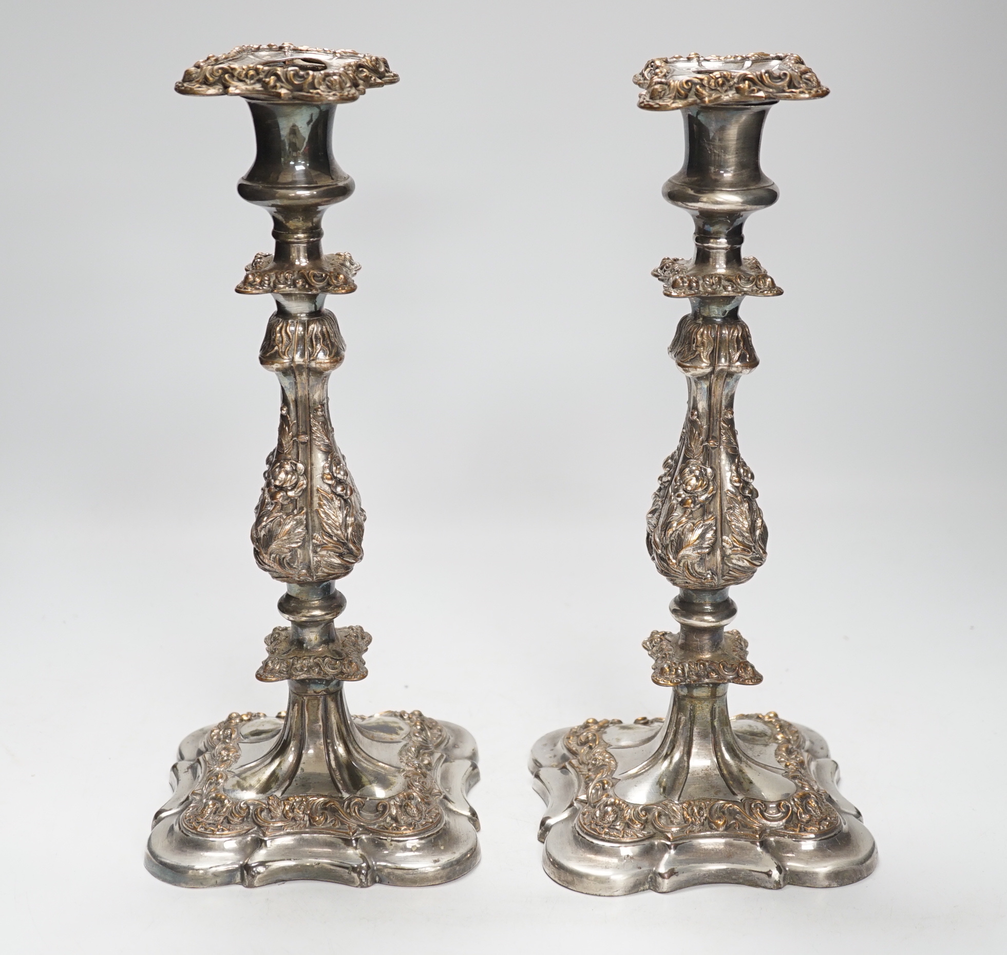 A pair of silver plate Sheffield candlesticks, 31cm high